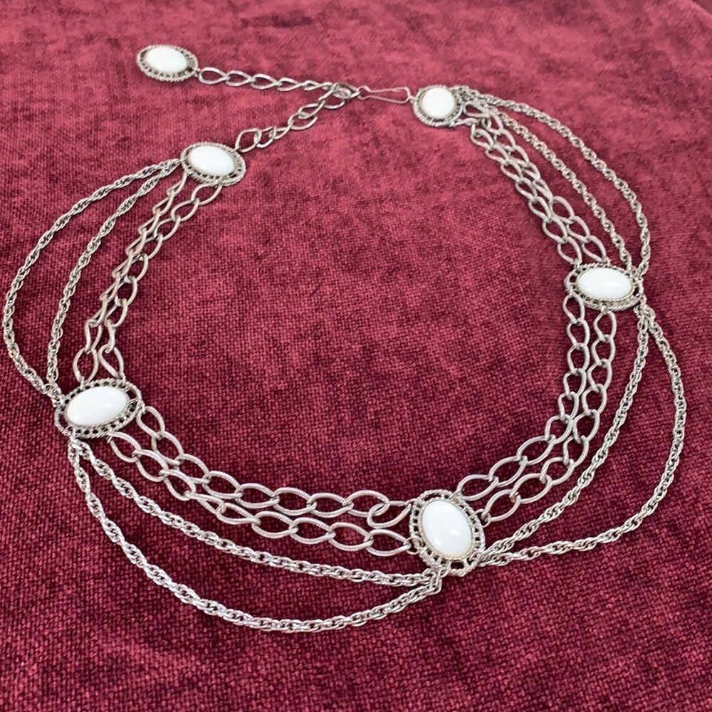 Silver and White metal belt